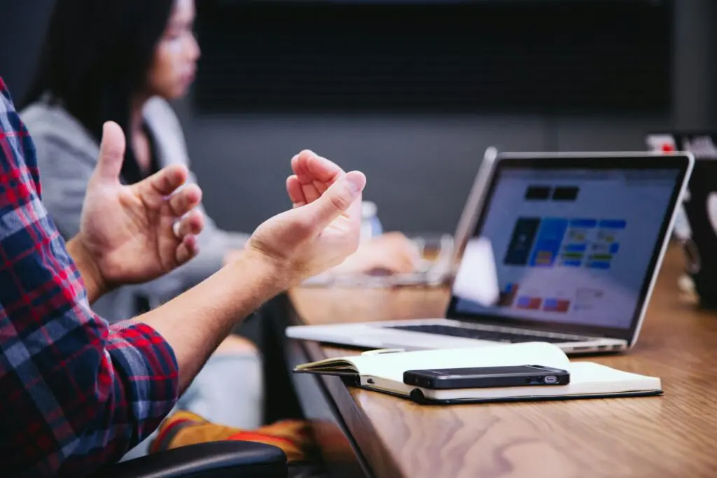 a person explain a concept to their team