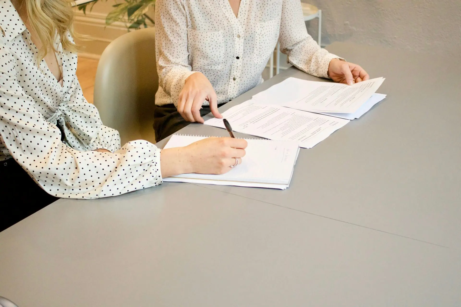 businesswomen doing financial report and calculation
