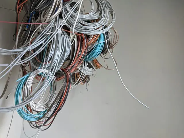 Tangled mess of wires symbolizing the complexity and lack of user autonomy in enterprise software.