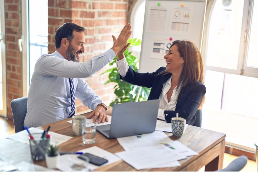 picture representing When your enterprise planning software actually works with people giving high five