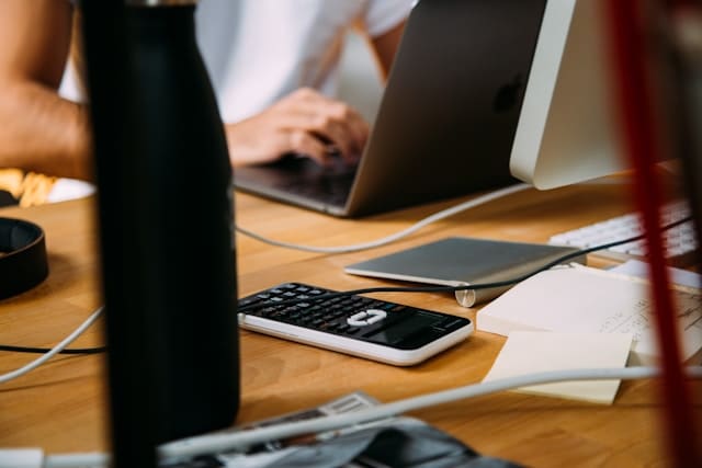 accountant using a calculator 